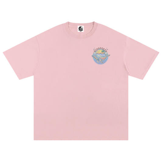 A light pink short-sleeve crewneck t-shirt with a small multicolour graphic on the left chest depicting a beach scene.