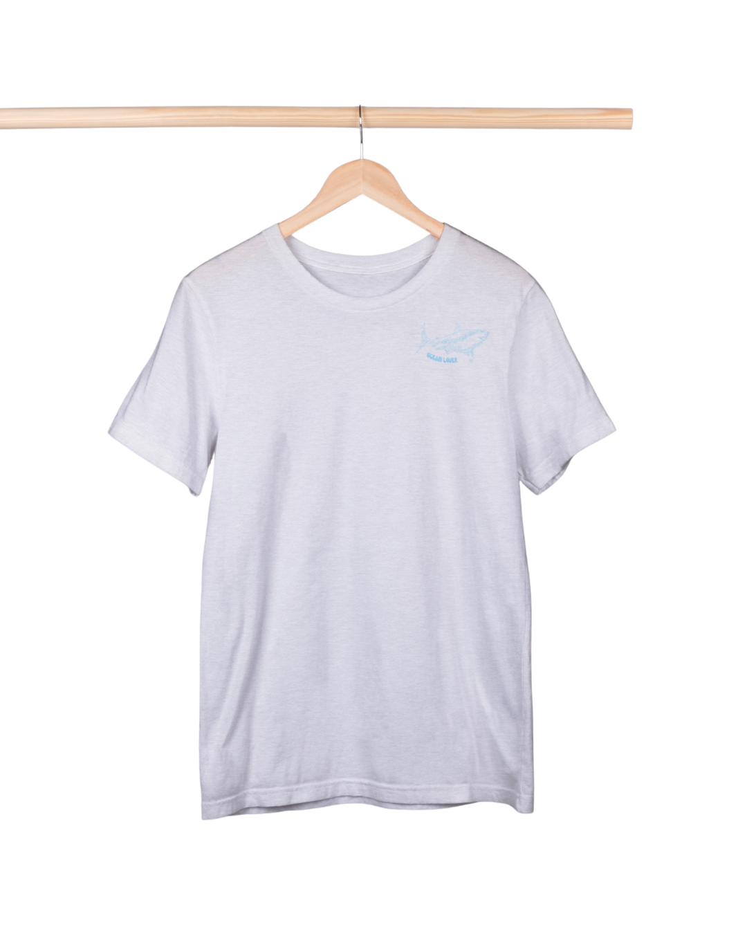White t-shirt with a small logo on a wooden hanger against a white background