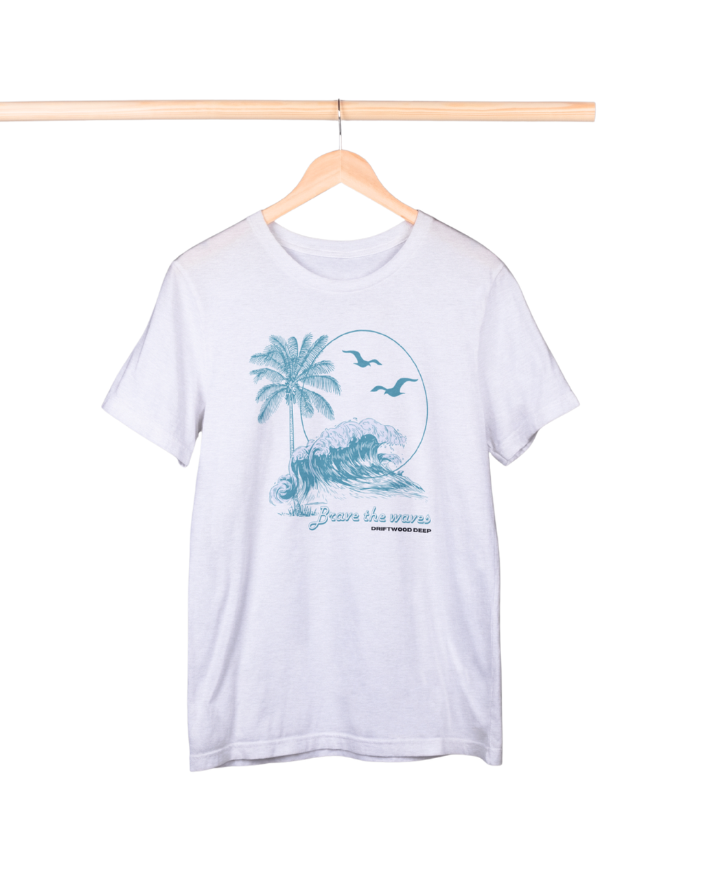 White t-shirt with a tropical graphic on a hanger against a white background