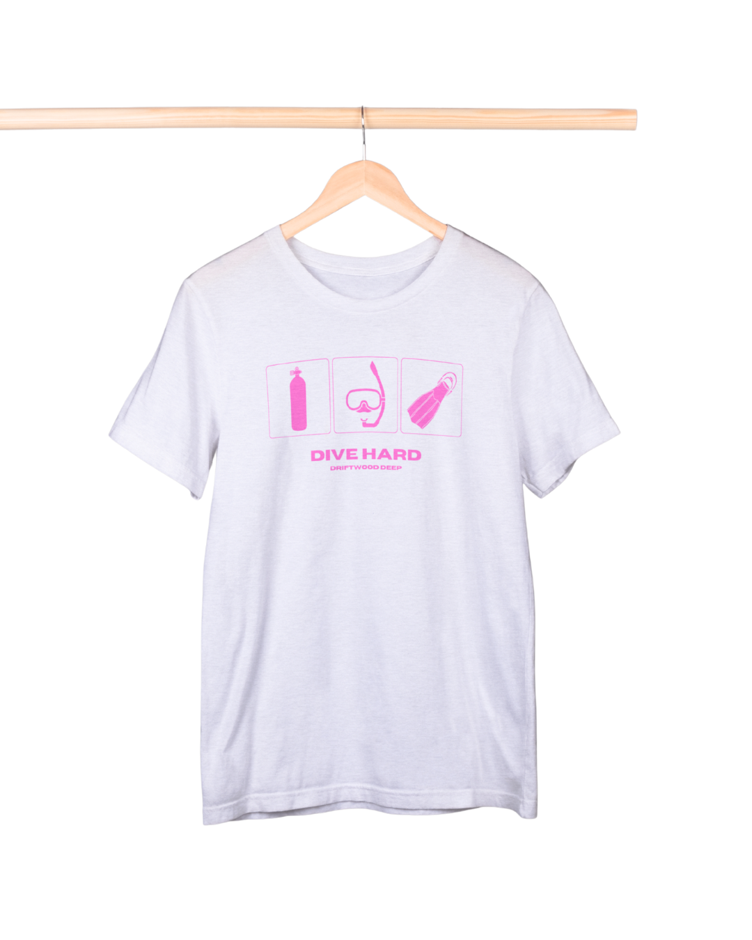 White t-shirt with pink scuba diving icons and 'DIVE HARD' text on a hanger against a white background