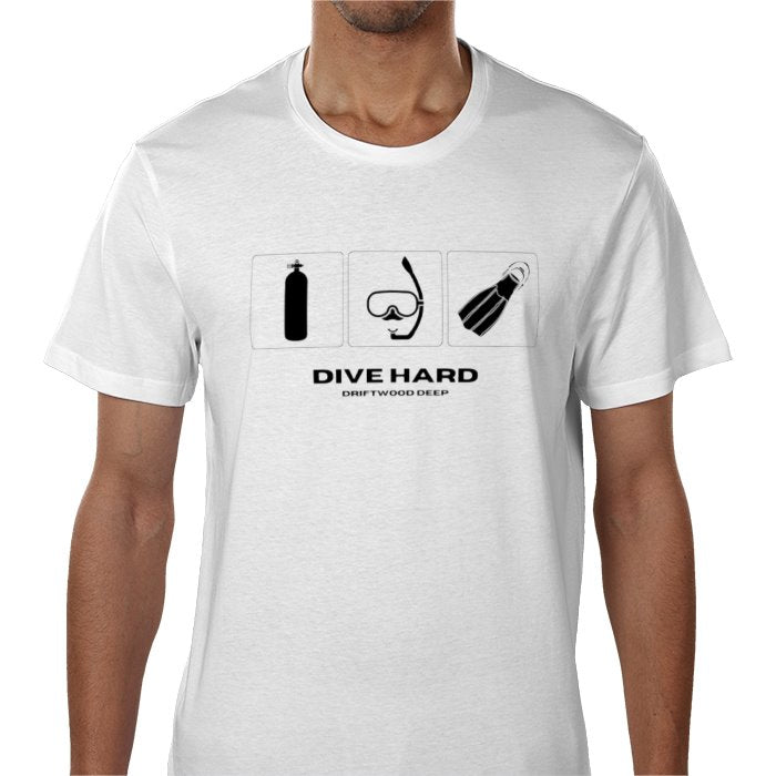 A person wearing a white crew neck t-shirt with a graphic print design featuring diving equipment and the text 'DIVE HARD'.