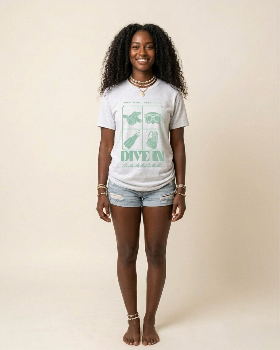 Woman wearing a t-shirt with a graphic design on a plain background