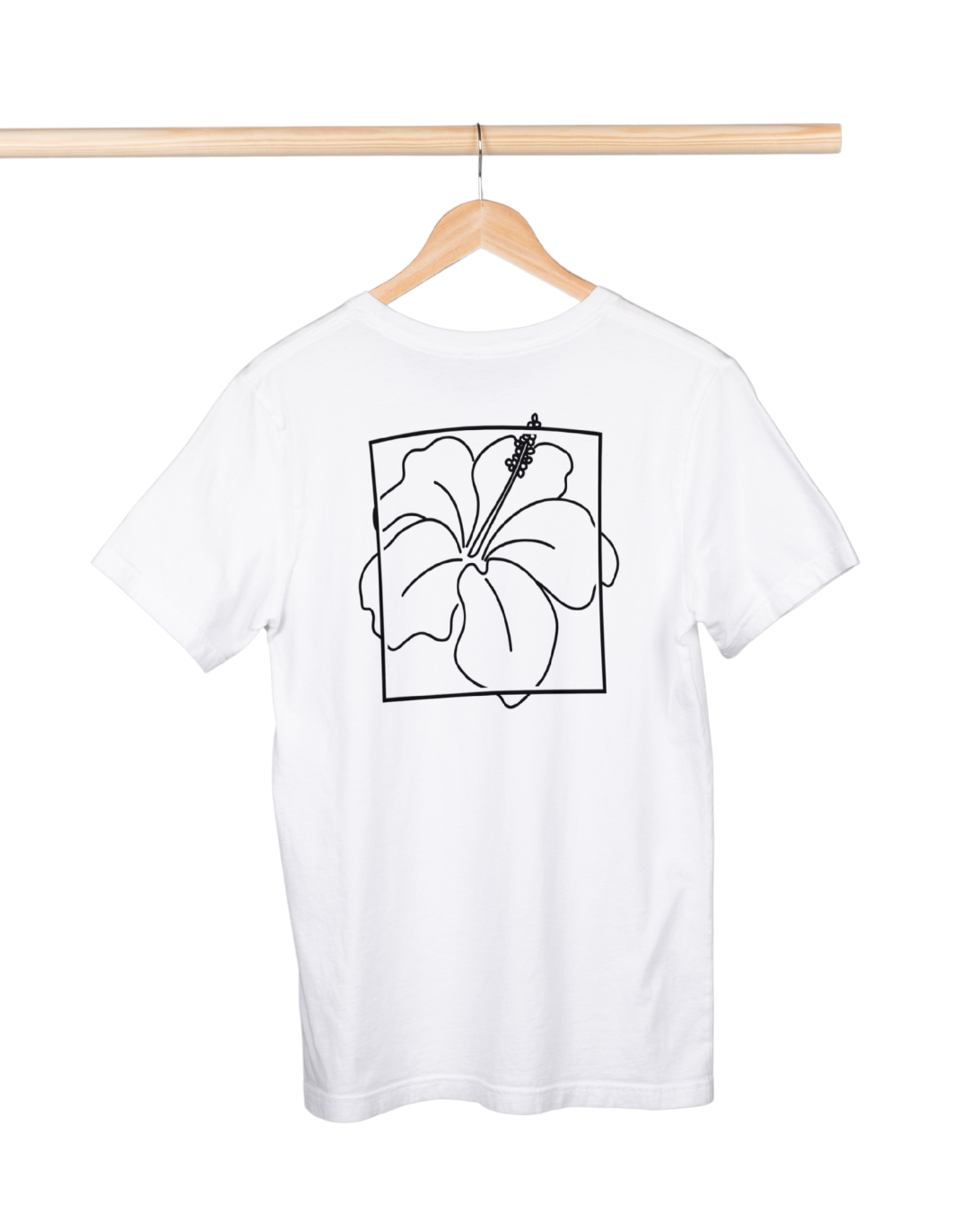 White t-shirt with black floral design on a hanger against a white background
