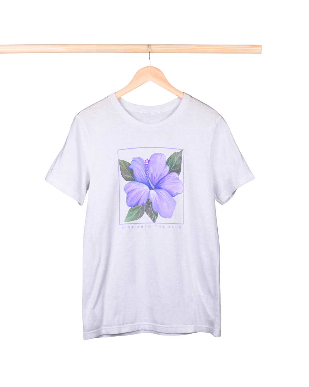 White t-shirt with a purple flower graphic on a hanger against a white background