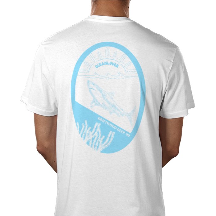 A person wearing a white crew neck t-shirt with a graphic print of a shark in sky blue on the back.