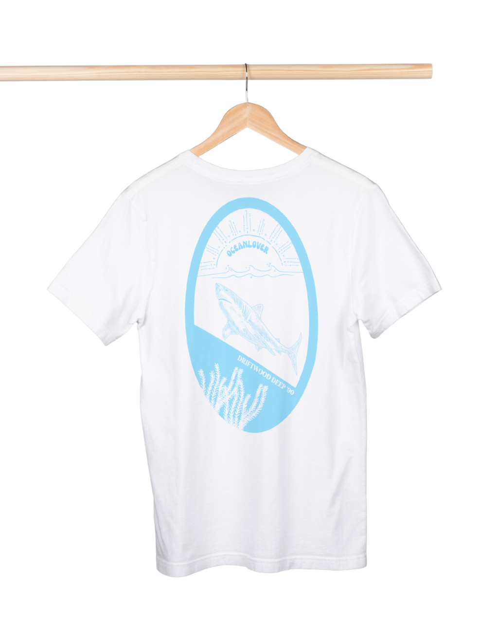 White t-shirt with blue graphic on a hanger against a white background