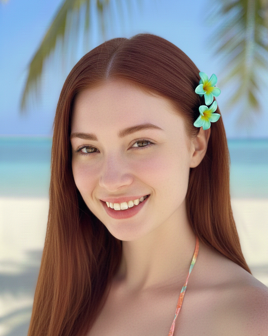 Woman with a flower in her hair on a beach