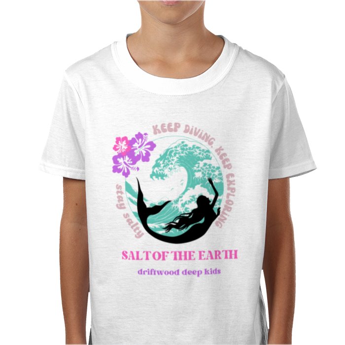 A child wearing a white crew neck t-shirt with a graphic print that includes a mermaid and text reading 'Salt of the Earth - driftwood deep kids'.