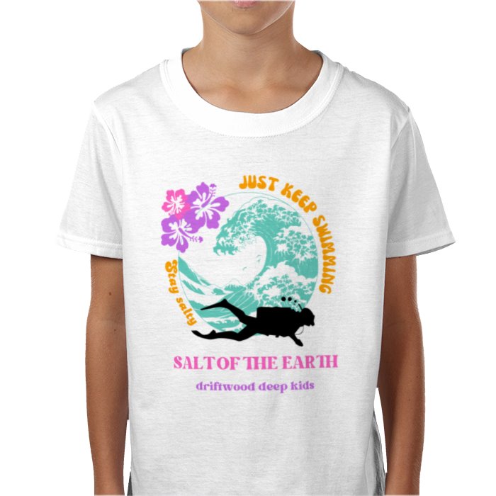 A child wearing a white crew neck t-shirt with a vibrant graphic design of a scuba diver and text 'Salt of the Earth - driftwood deep kids'.