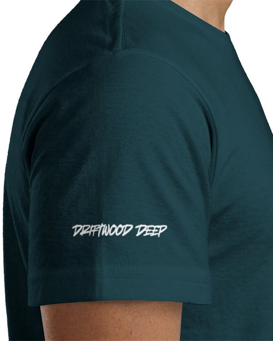 Teal t-shirt with 'Driftwood Deep' logo on a white background