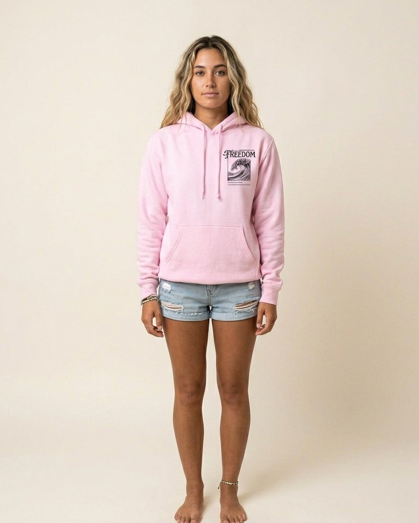 Person wearing a pink hoodie with a logo on a beige background