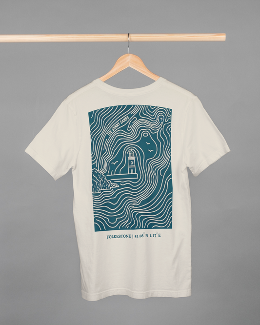 White t-shirt with teal graphic design on a hanger against a gray background