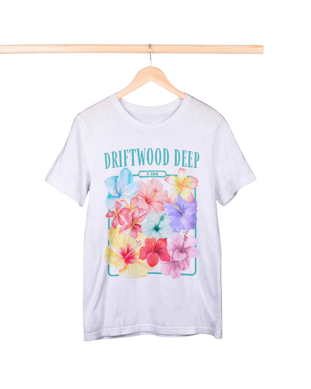White t-shirt with colorful floral design and 'Driftwood Deep' text on a hanger against a white background