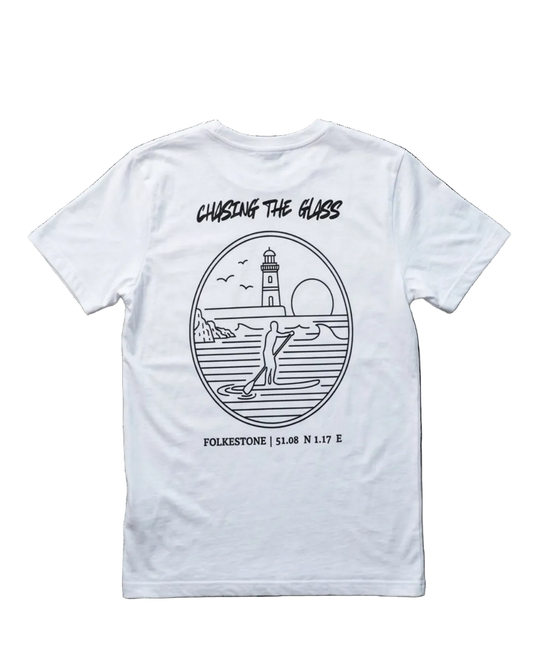 White short-sleeve t-shirt showing the back graphic print. The design features a black line art illustration of a surfer in a circular frame with a lighthouse, waves, and a sun, with the text 'CHASING THE GLASS' above and 'FOLKESTONE | 51.