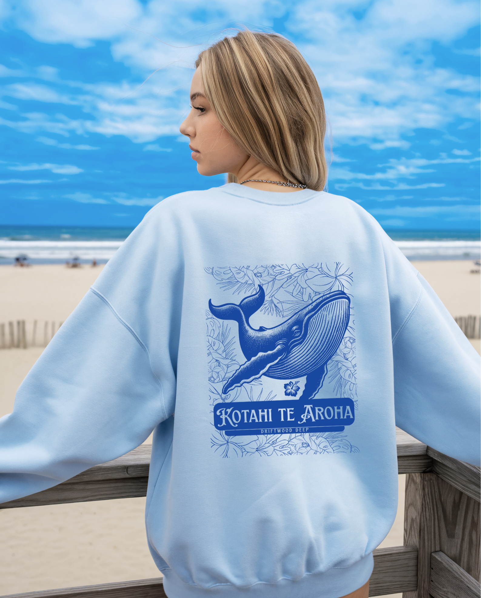 woman wearing a blue sweatshirt